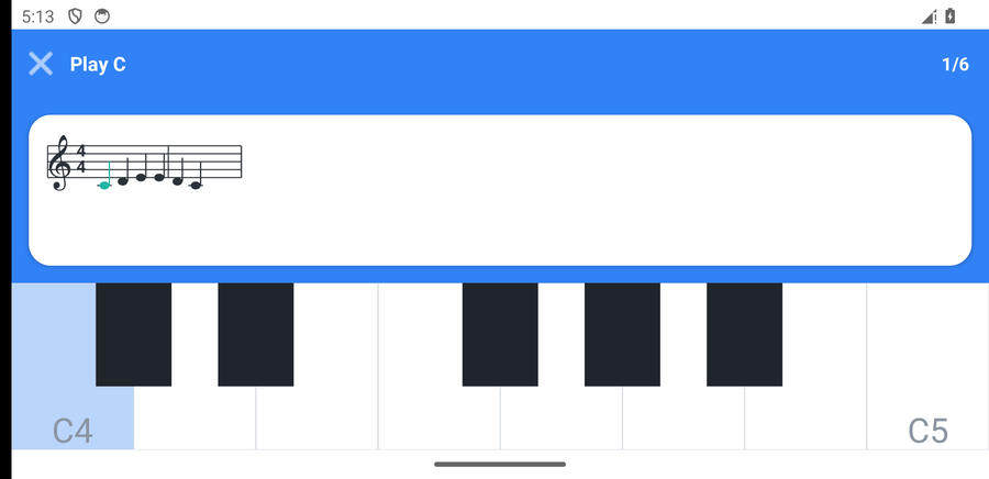 A lesson screen — the note to play is shown on the staff and the key lights up below